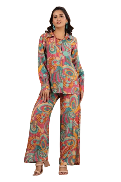 Woman wearing colorful retro-patterned matching shirt and pants set.